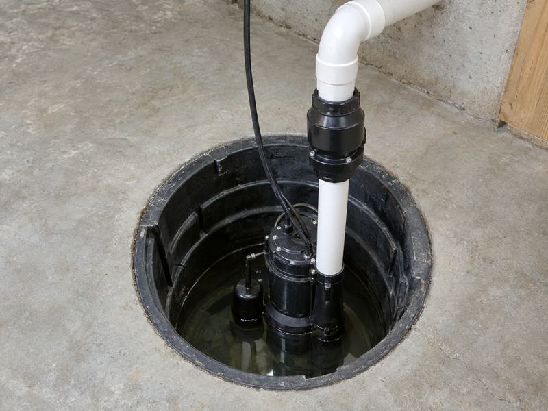Sump pump installed in a basement sump pit in Asheville, NC